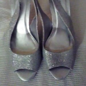 Silver high heal sling back open toed shoes
